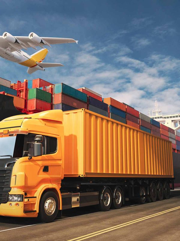 A bright yellow truck is on a highway next to stacked shipping containers, with a plane flying overhead against a clear blue sky, representing truck rental Dubai and global transport.